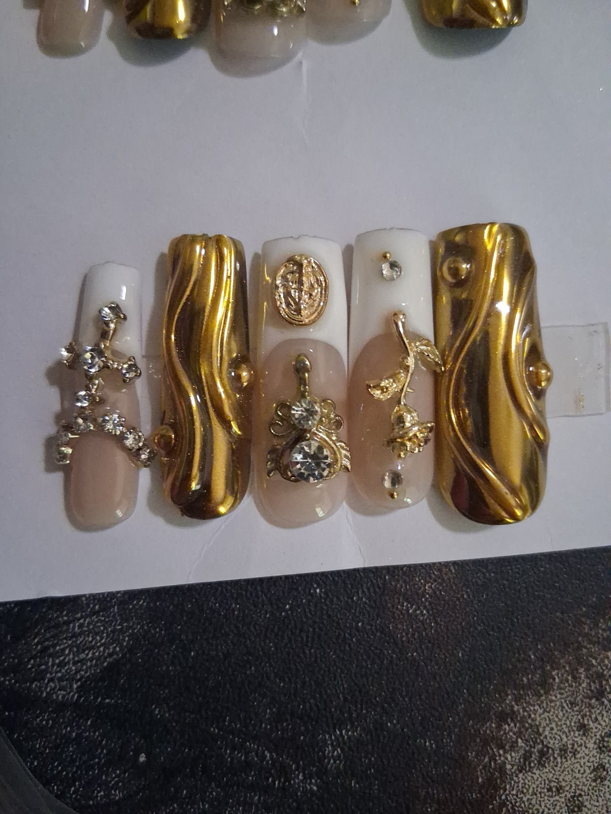 Size Medium Hand Crafted Faux nails Gold/rhinestone Long