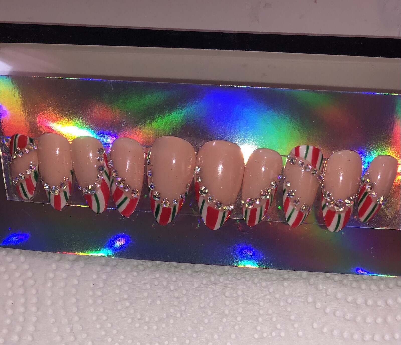 Festive Holiday Red and White Striped Nail Set with Rhinestones