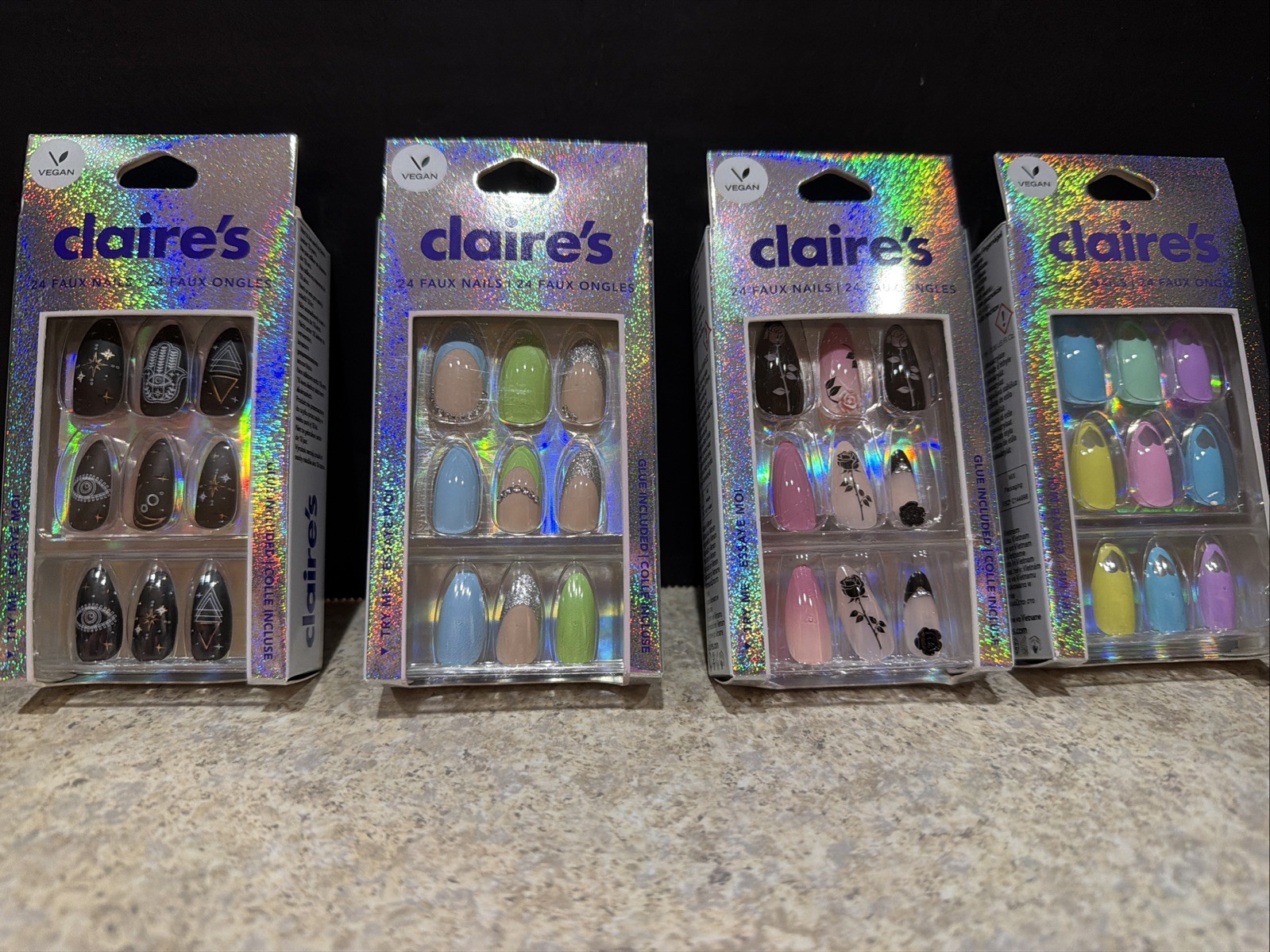 4 pack of 24 Press-On Nails Claire’s Faux Nails glue not included