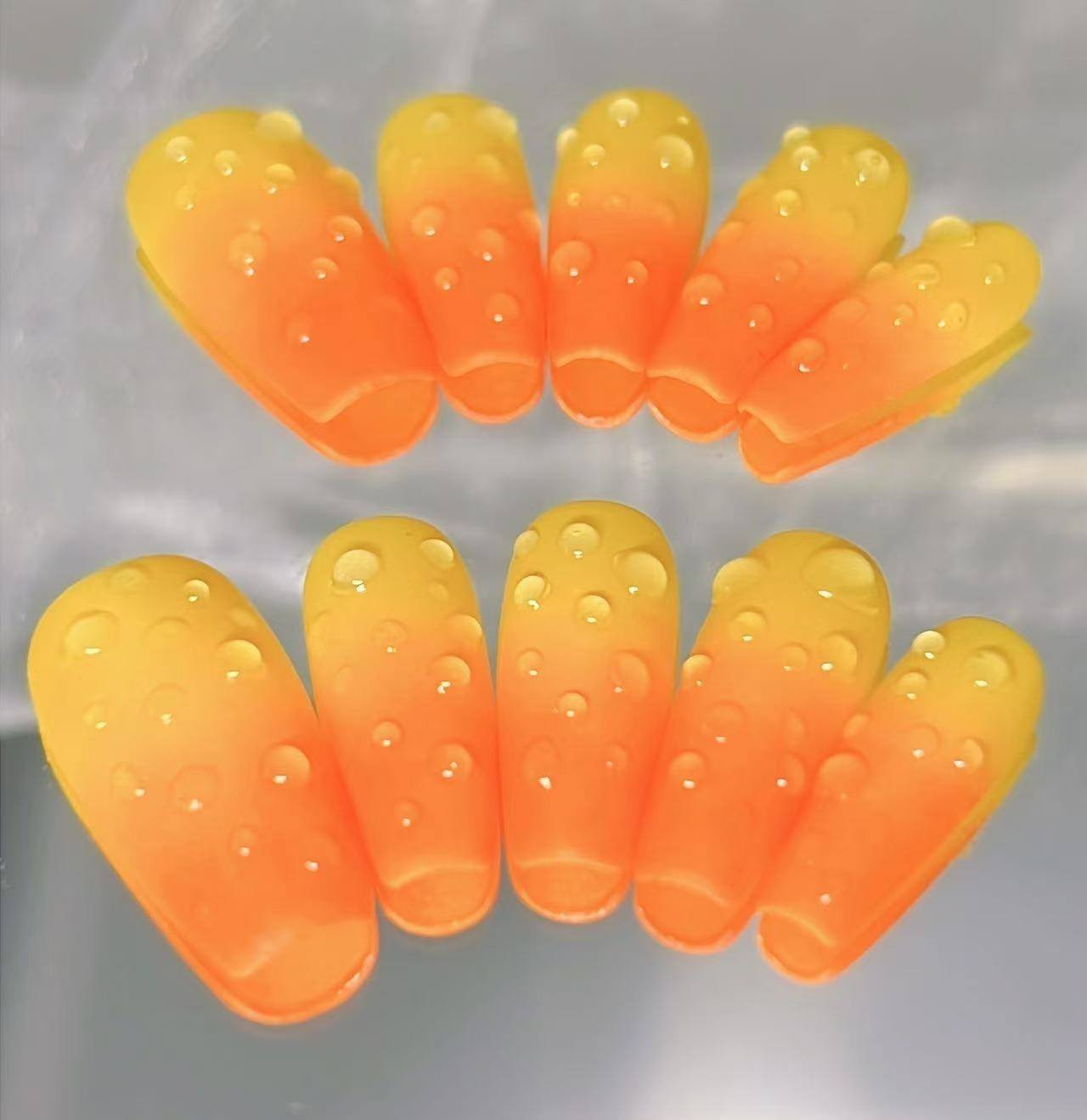 Vibrant Orange Gradient False Nails with 3D Bubble Design.Medium Coffin Size.