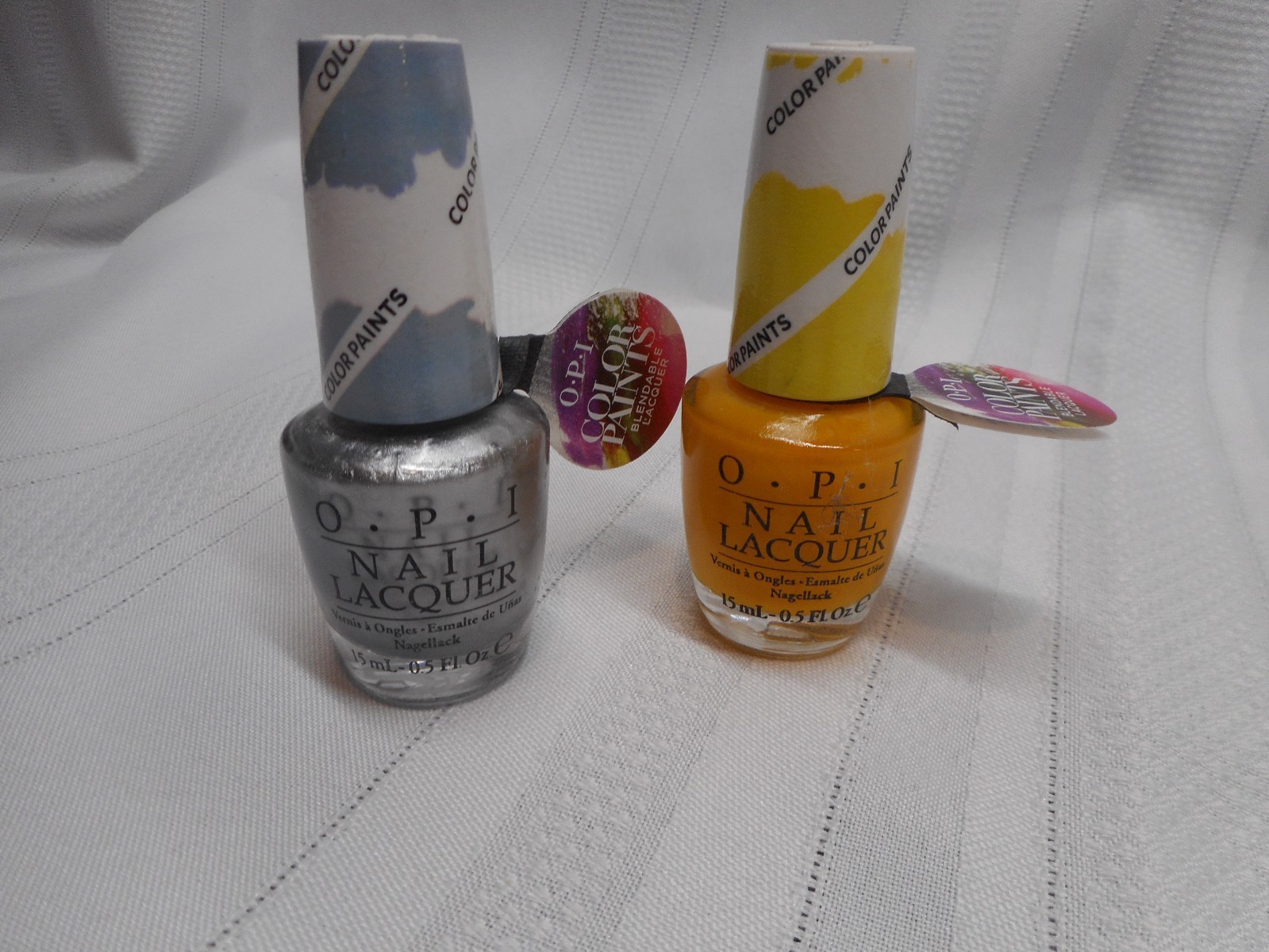 OPI Nail Polish Lacquer Color Paints Silver Canvas and Primarily Yellow
