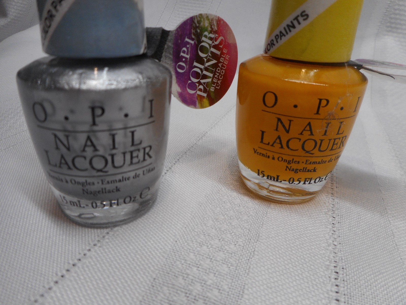 OPI Nail Polish Lacquer Color Paints Silver Canvas and Primarily Yellow