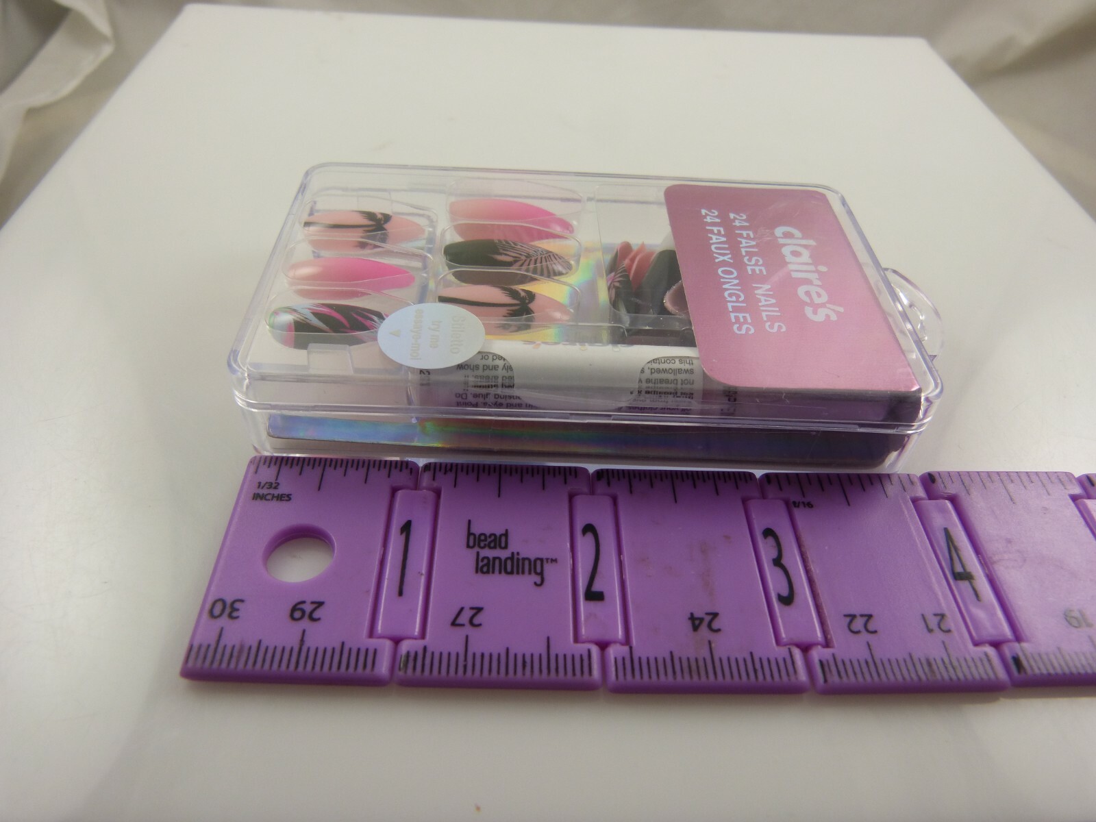 Claire’s faux nails summer palm trees pink black blue glue elegant fun