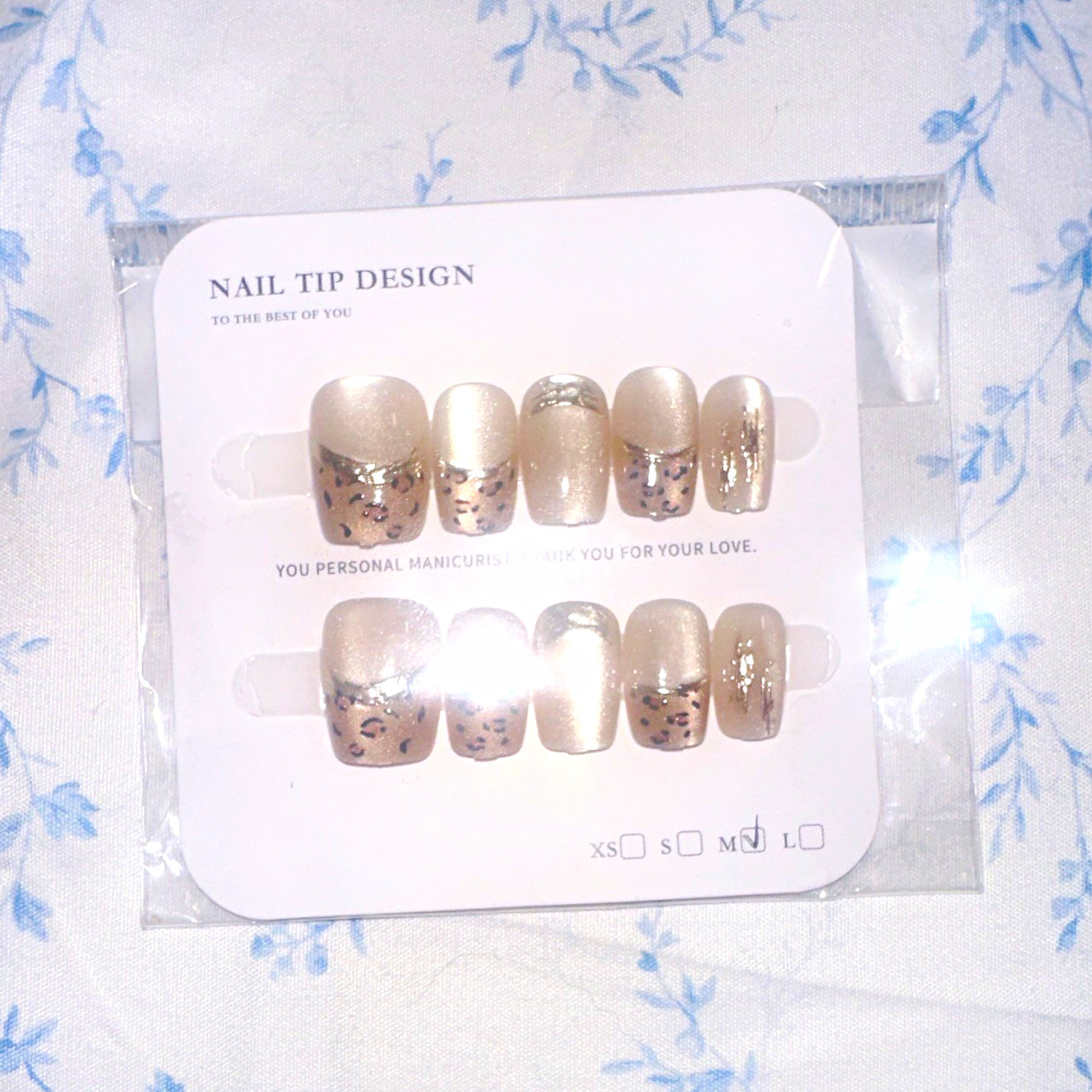 Shimmery gold Leopard press on nails size medium perfect length and gold detail