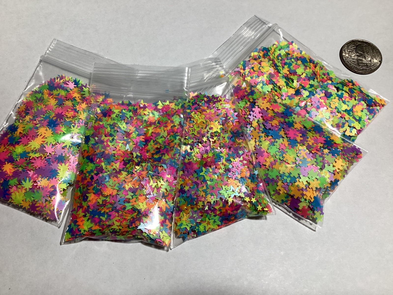 neon bags of glitter