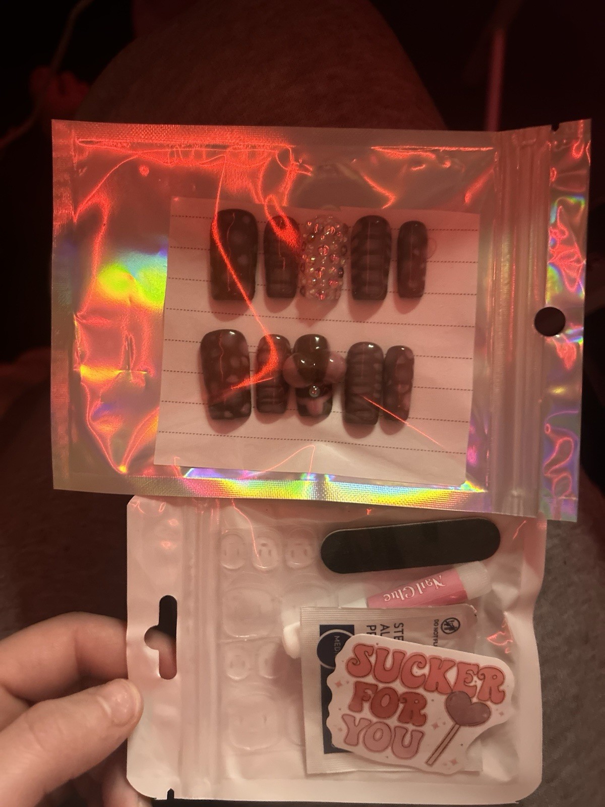 press ons they come with nail file, glue, sticker, and the packaging
