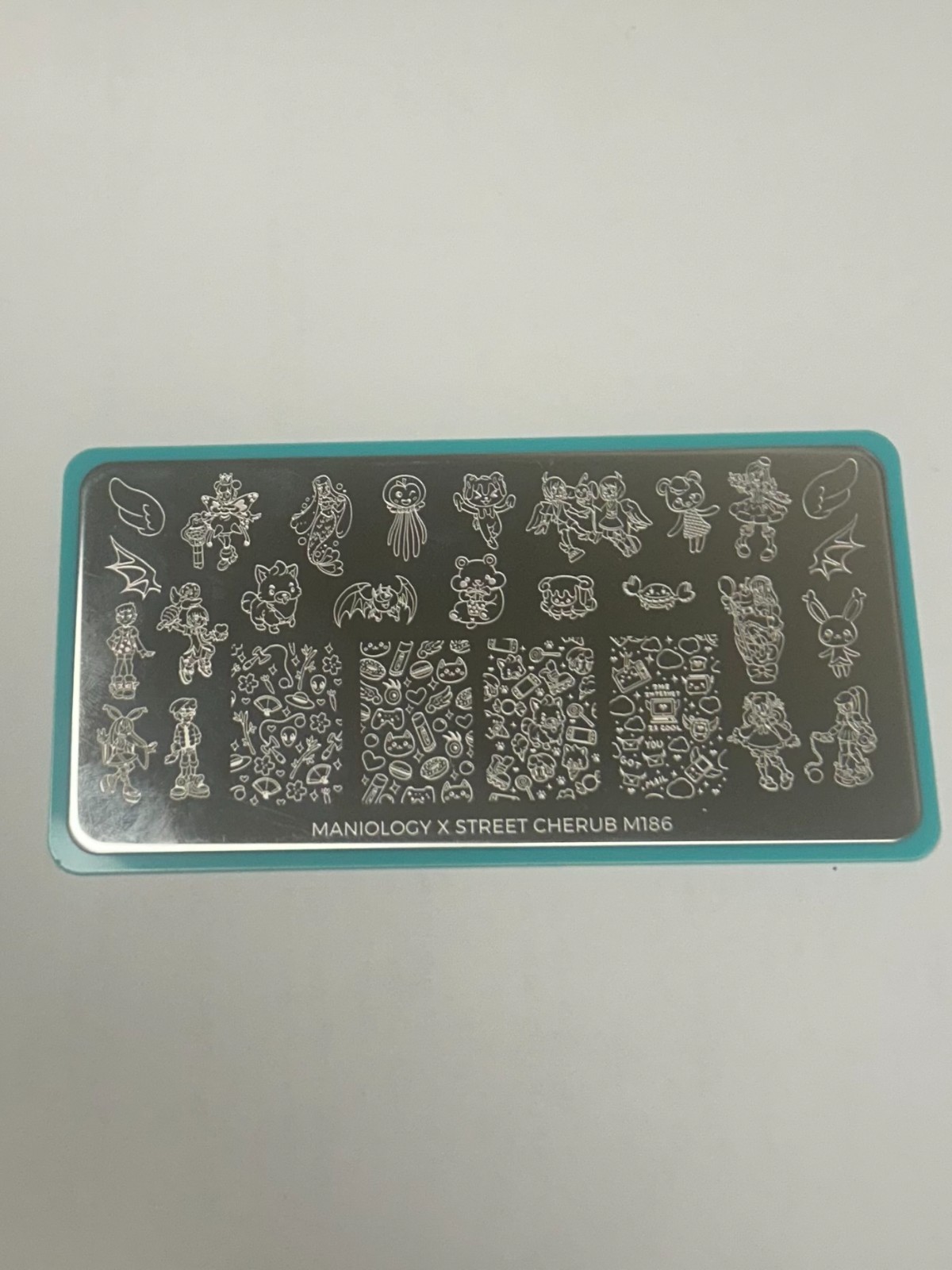 Maniology M186 X STREET CHERUB Nail Stamping Plate (discontinued, rare find)