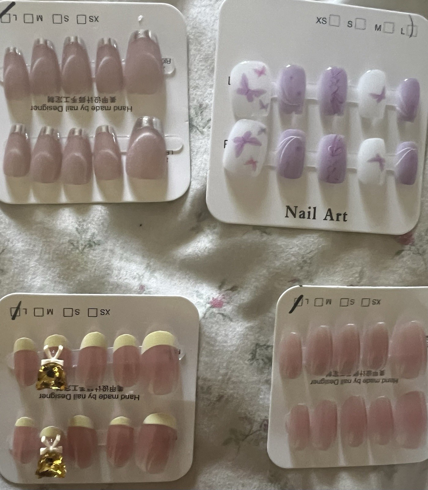 Set of 4 packs. Pink/White/Purple French Butterfly Press-On Nails Medium Oval.