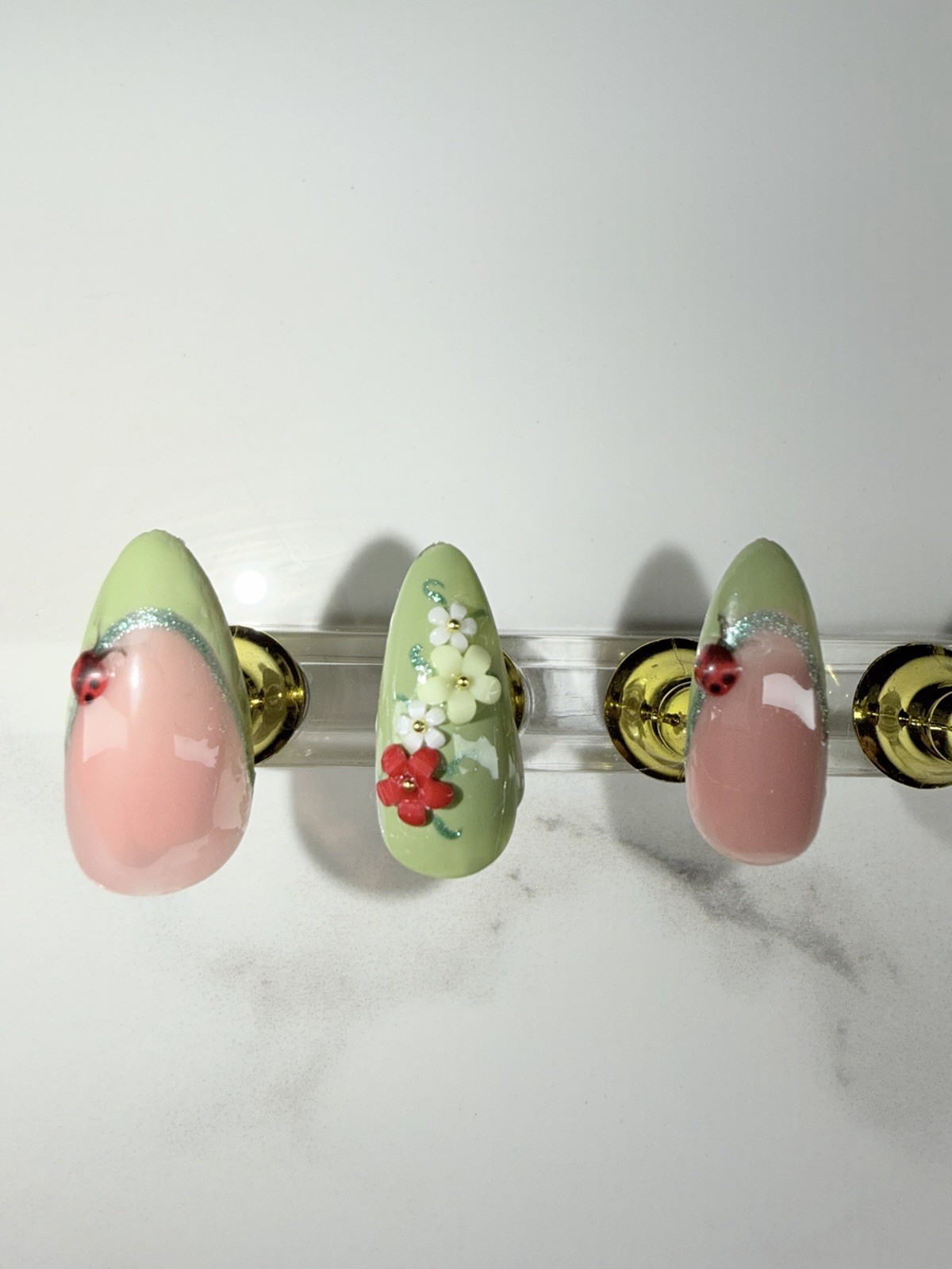 Custom green press on nails with 3D ladybugs & flowers. DM for sizing