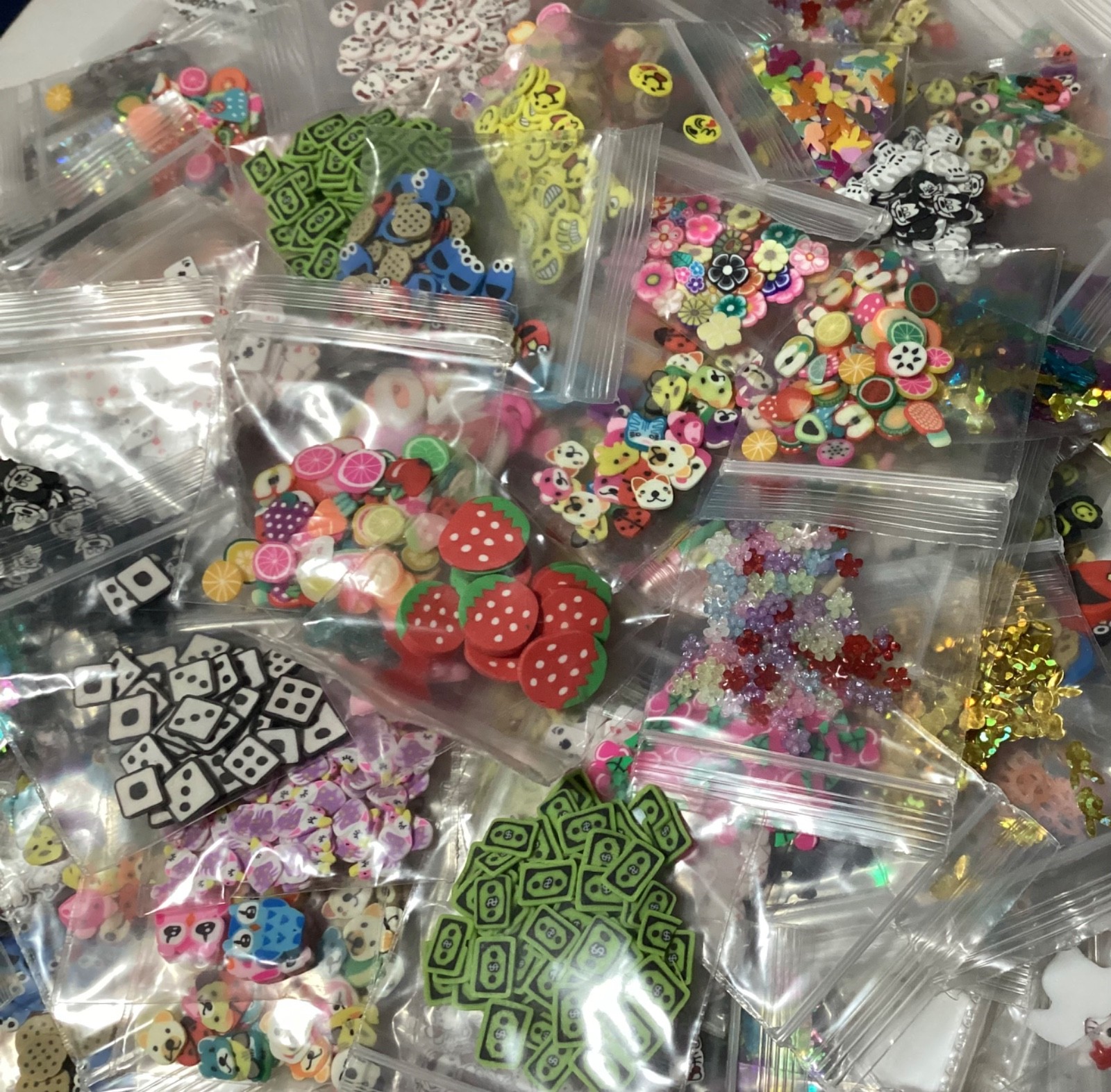 10 poly clay plastic just a pinch bags of glitter.