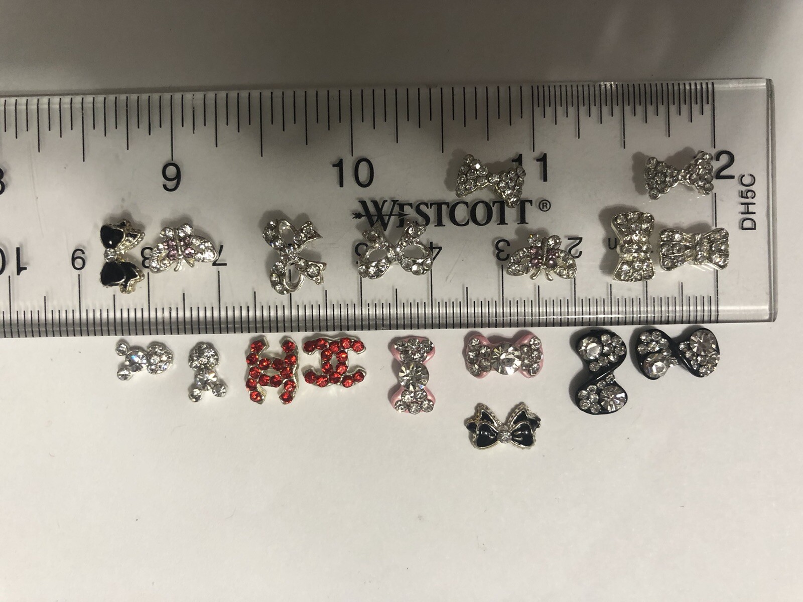 3D nail art decorations rhinestone tie bow butterfly black pink resin silver red