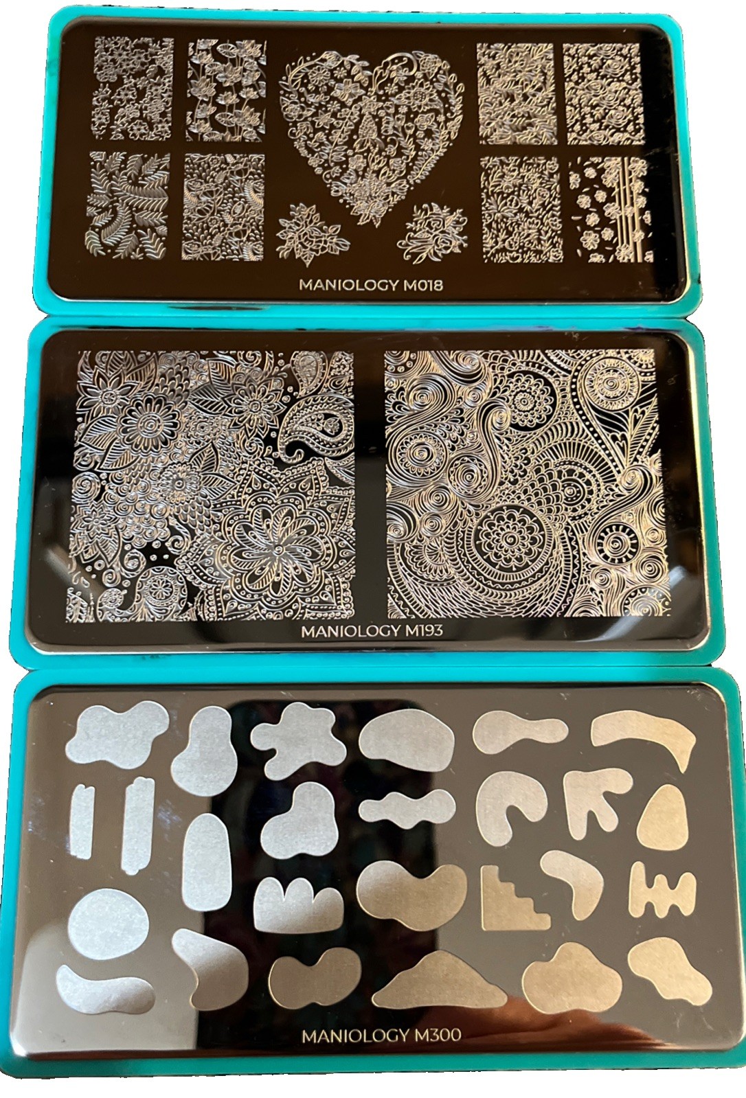 Maniology Nail Stamping Plates – Misc. Design – M193, M300, M018