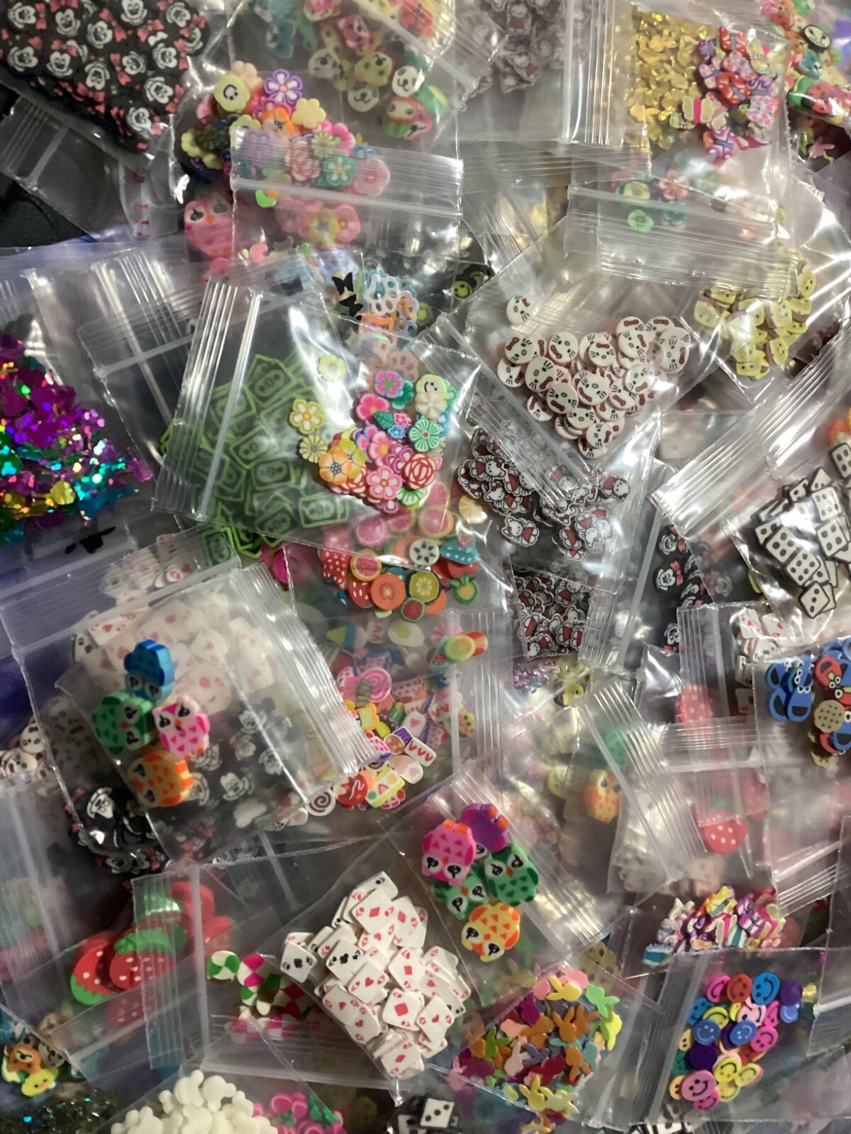 10 poly clay plastic just a pinch bags of glitter.
