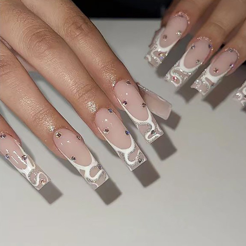 48pcs-Glossy Nude Press on Nails, Coffin with White Swirl and Rhinestone Details