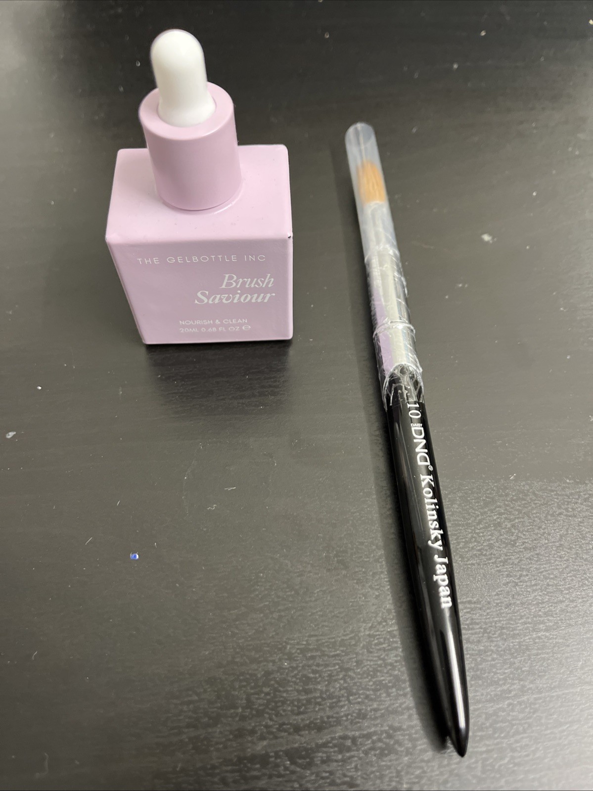 The Gelbottle Inc Brush Savior and DND Kolinsky Japan Brush