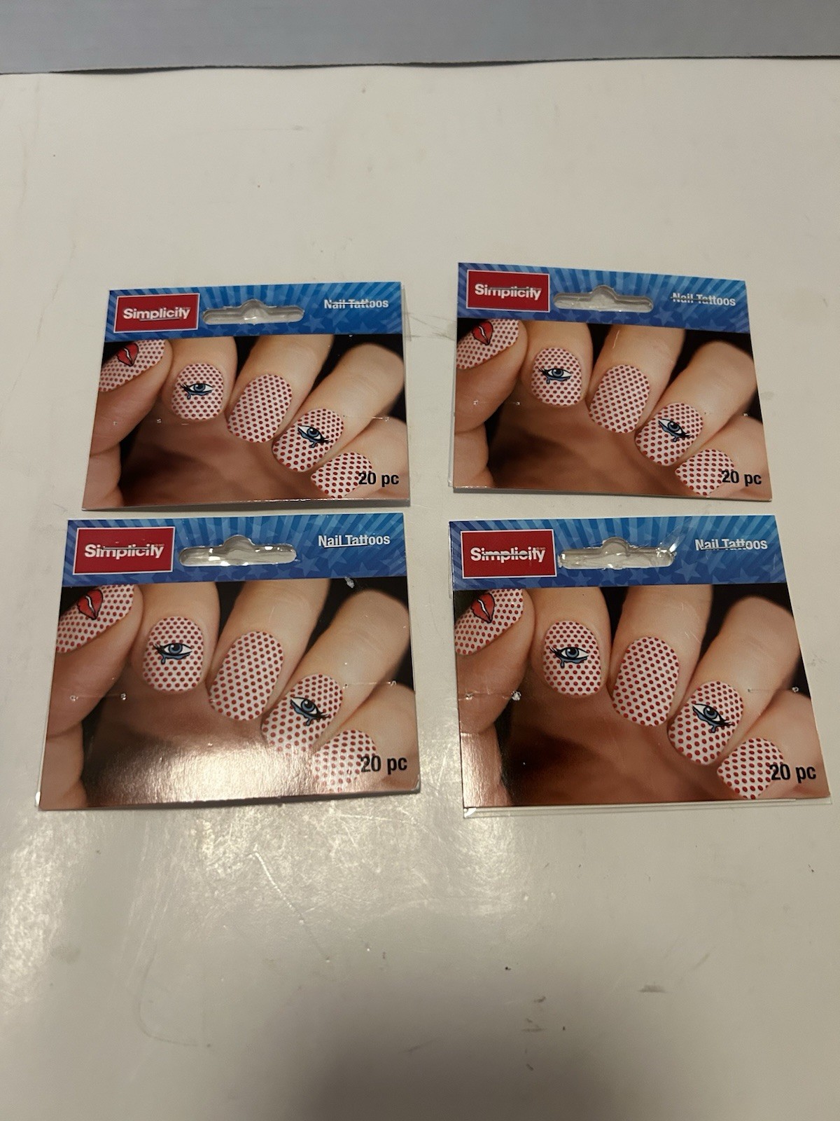Simplicity Nail Tattoos; Lot Of 4 Packages. NEW.