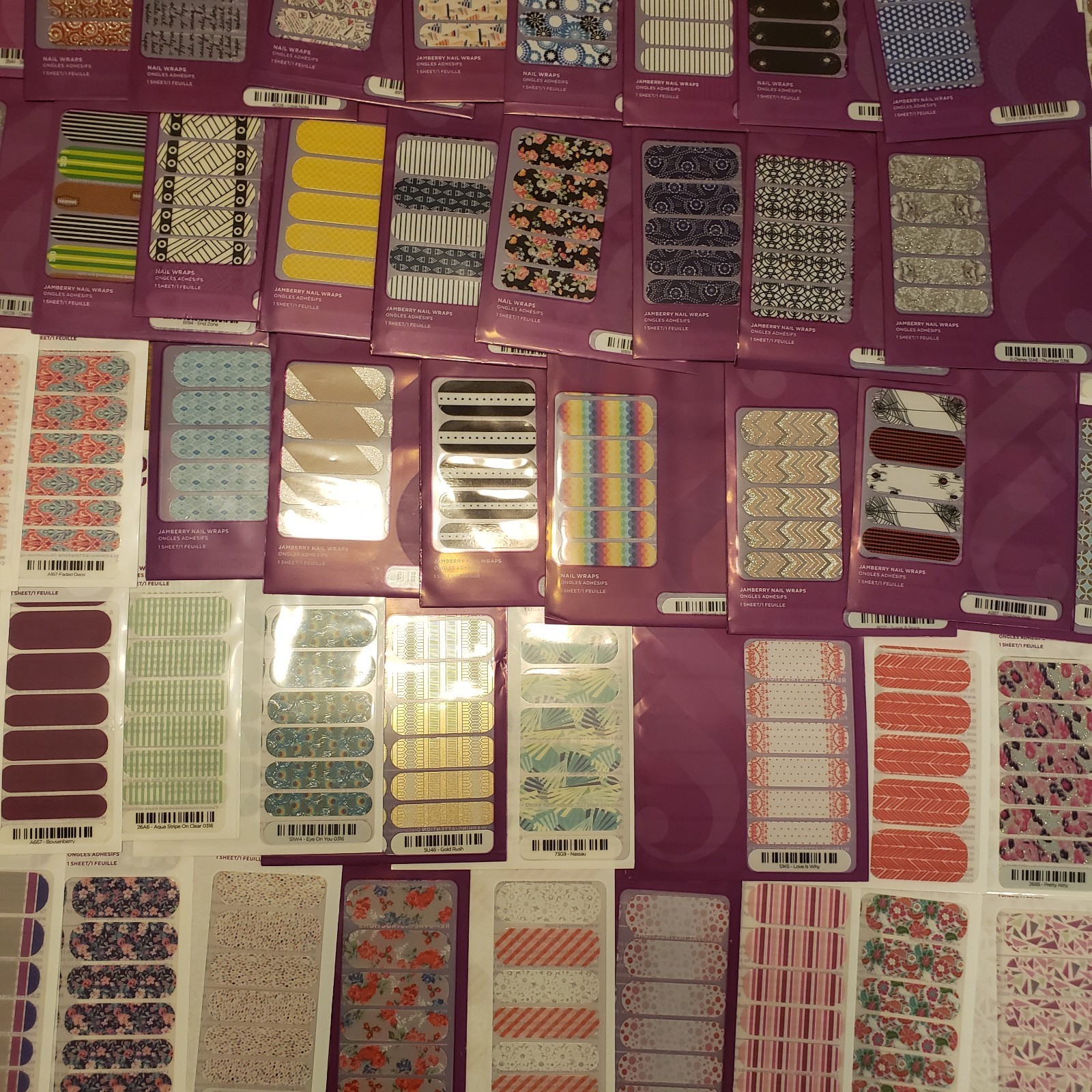 Massive Lot Of Jamberry Nail Wraps 180 full sheets plus partial sheets