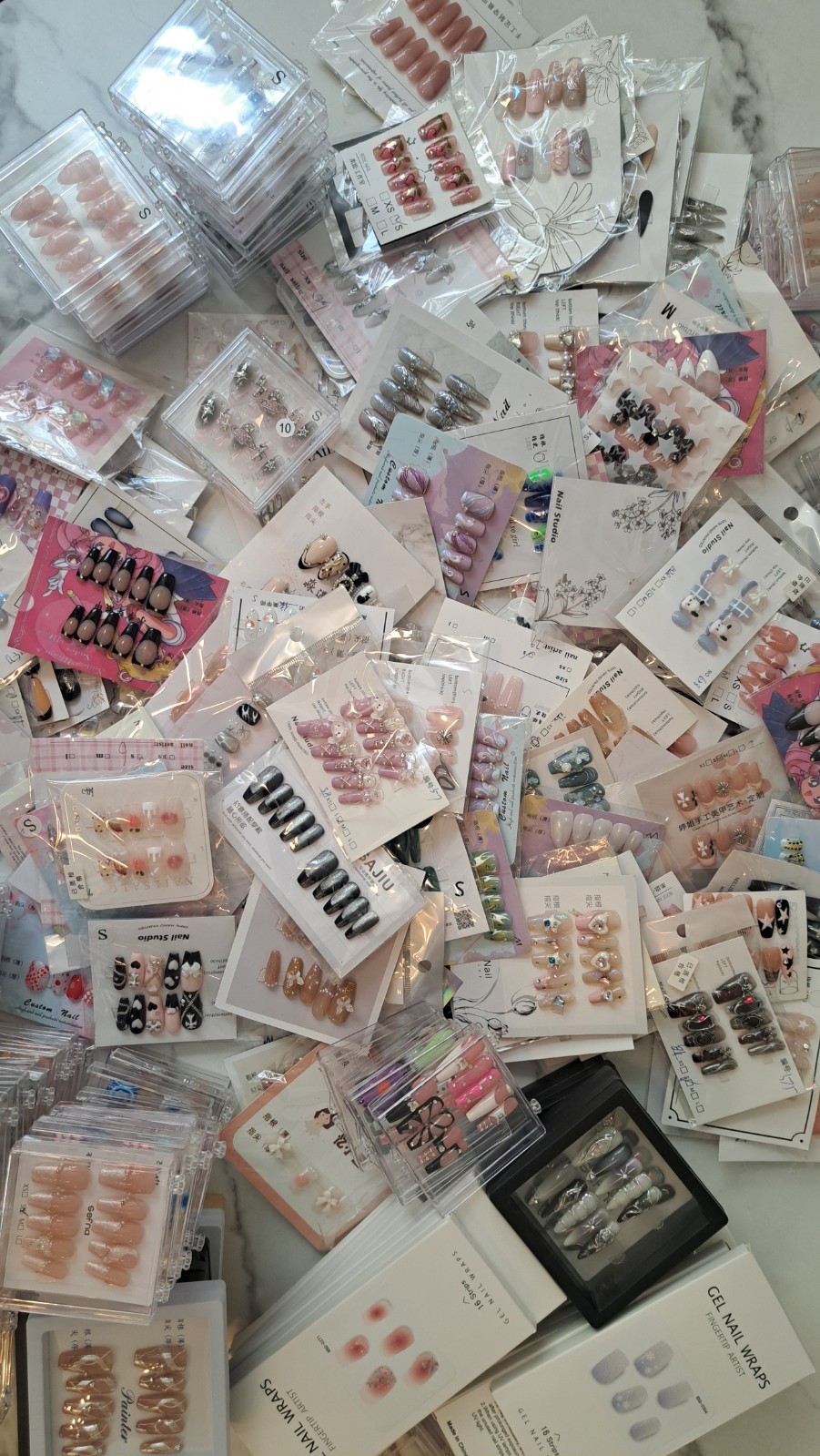 215 Sets of New Press-On Nails