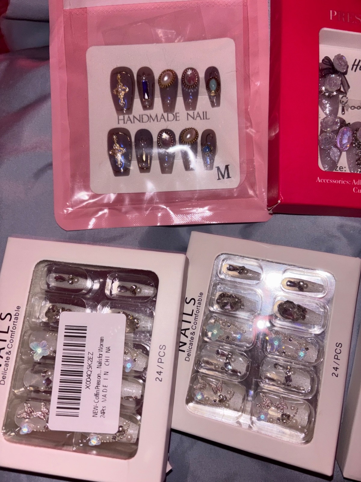 Multiple boxes jeweled nails