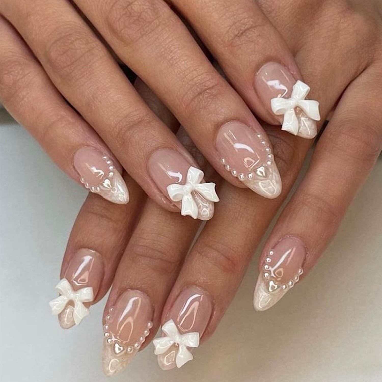 24Pcs Almond Press on Nails French Tips Short Fake Nails with Cute Bow Charms