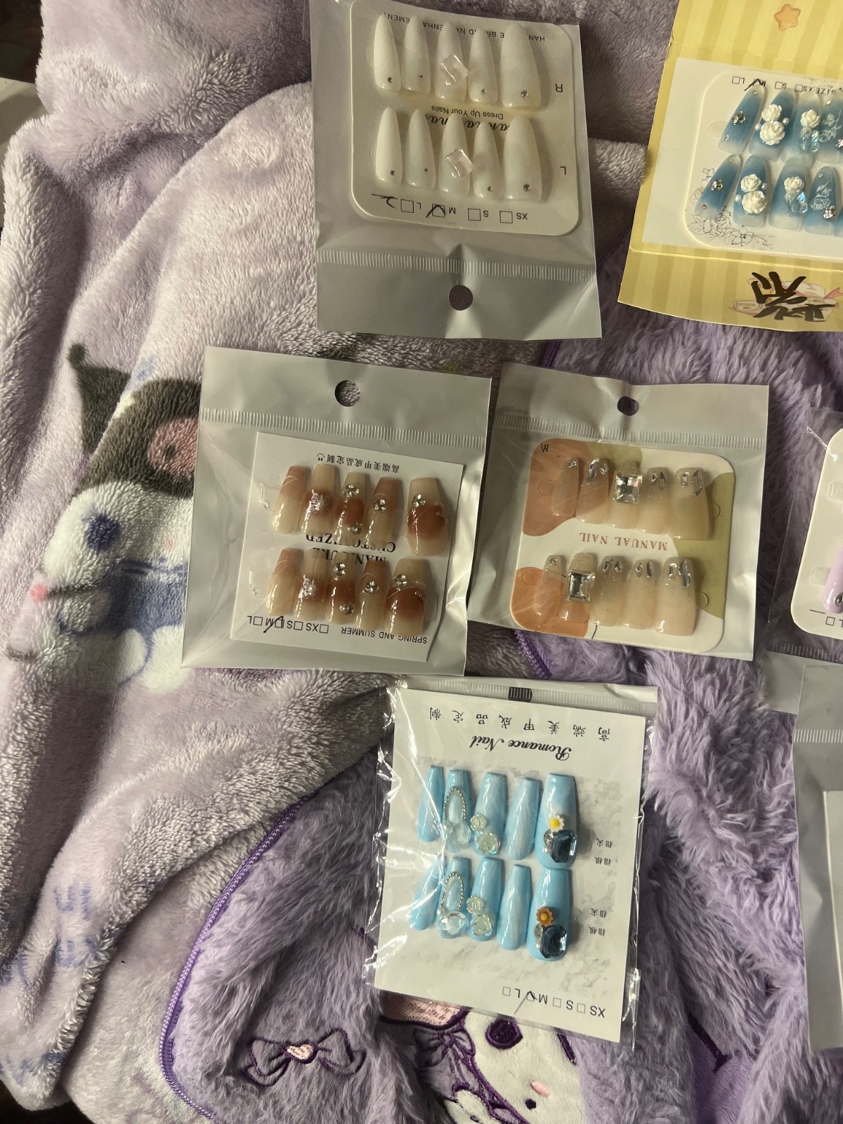 Super high quality, reusable, handmade press on nails. You get 5 pairs with glue