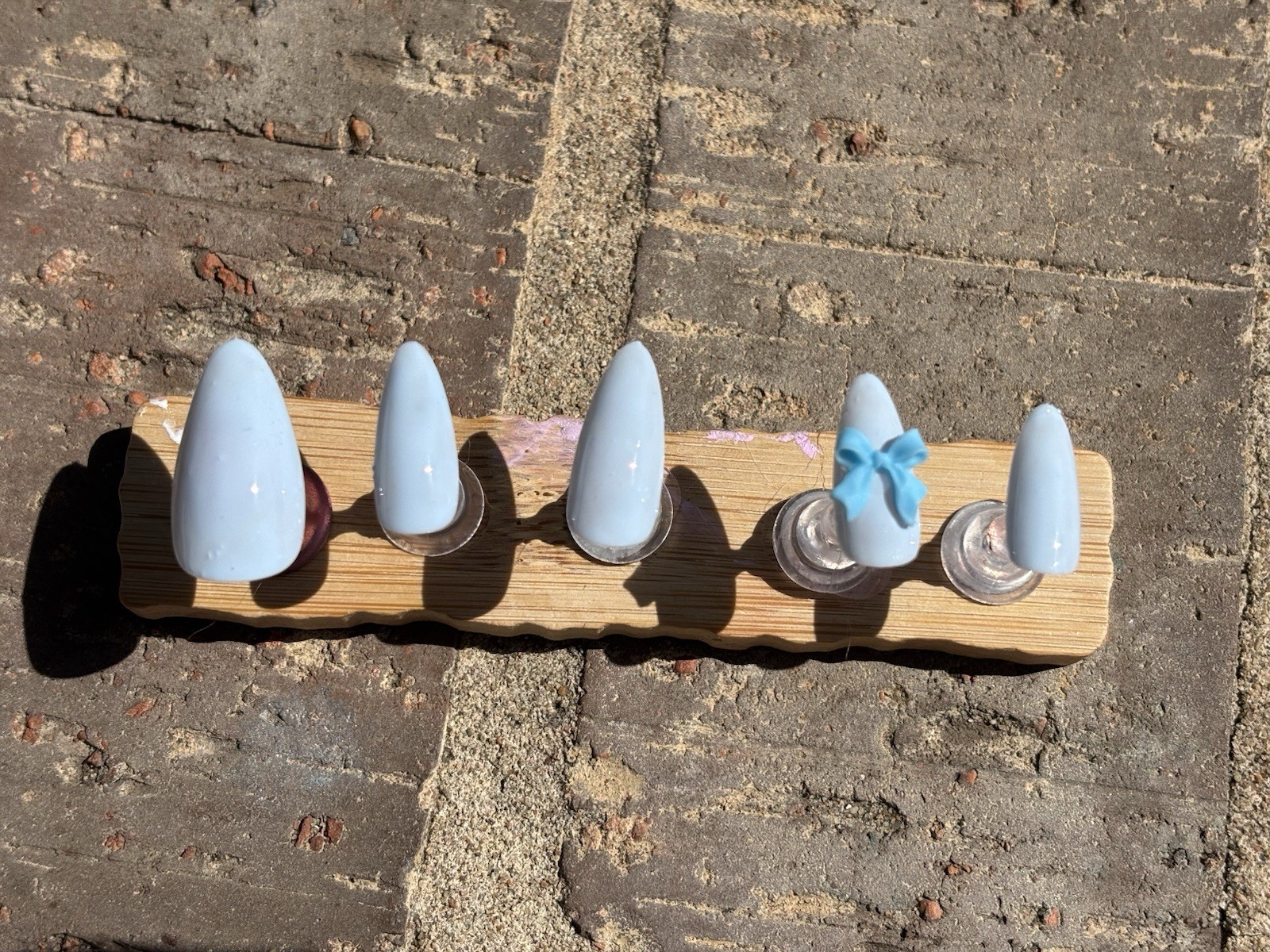 Beauty in blue, basic blue handmade nail design with a blue bow!