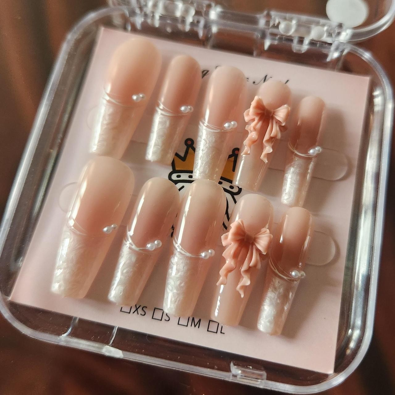 Pink & pearlescent French Tip Press-on Nails w/ Pearls & Bows. 3.0 Coffin. Sz S.