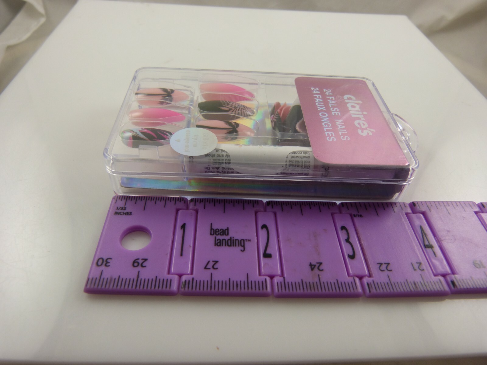 Claire’s faux nails summer palm trees pink black blue glue elegant fun