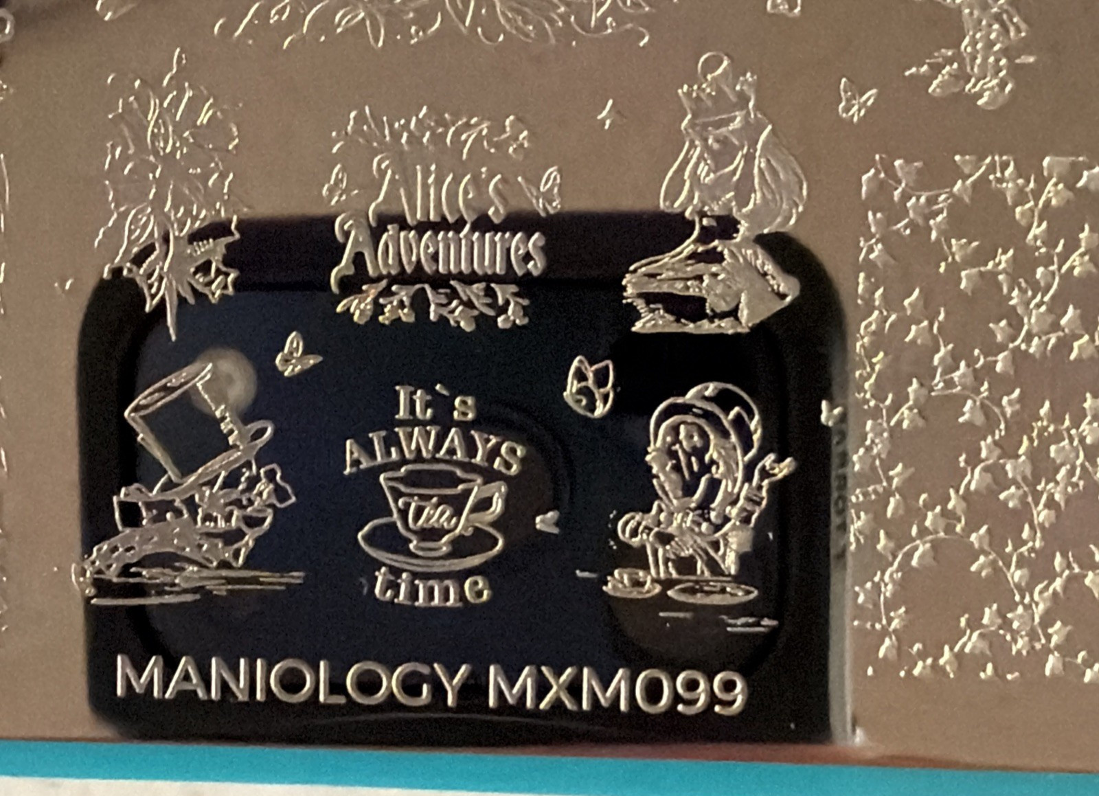 Maniology Through the Looking Glass: Mad for Tea MXM099 & Hearts & Havoc MXM100