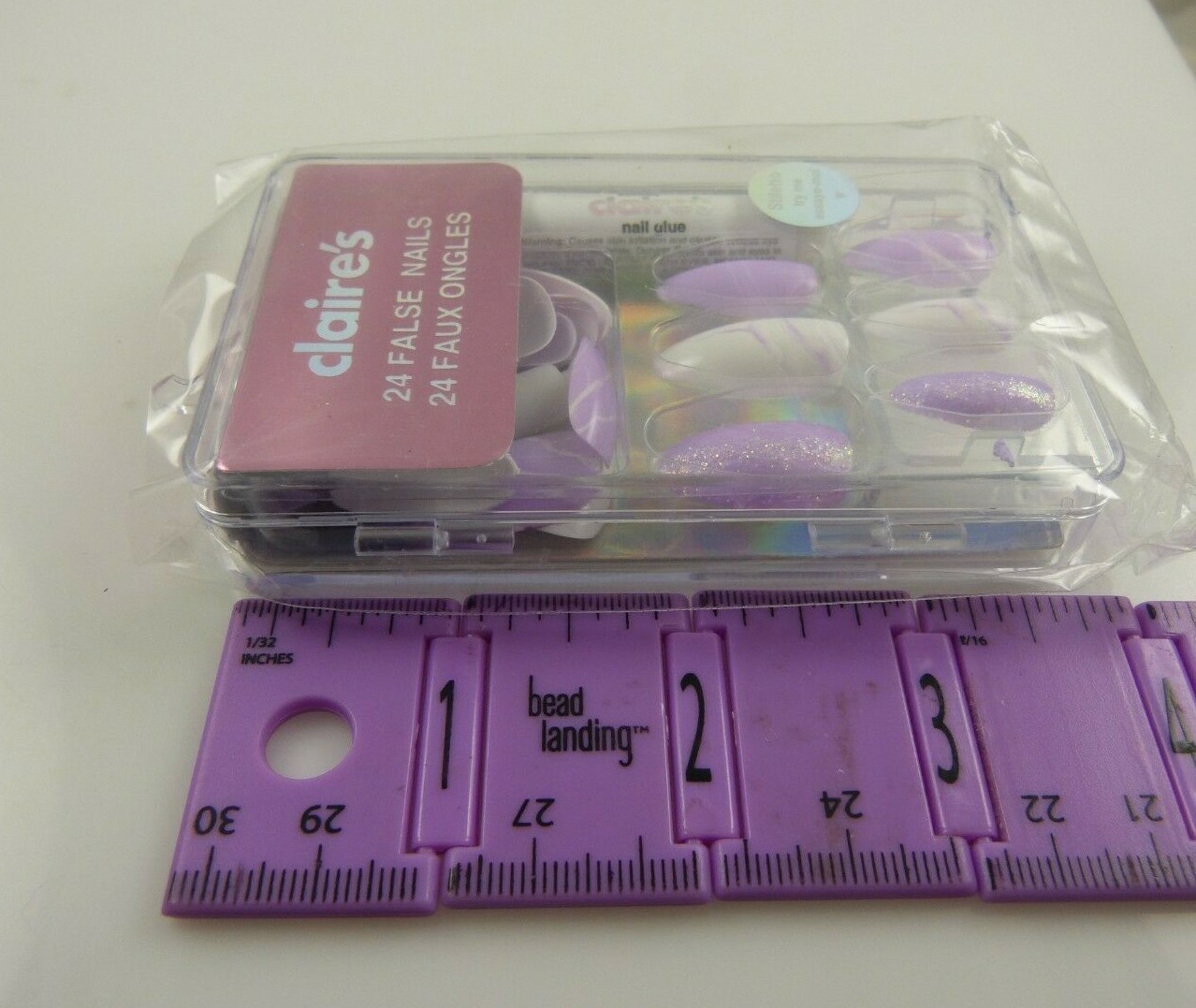 Claire’s faux false nails Purple and white with glue elegant