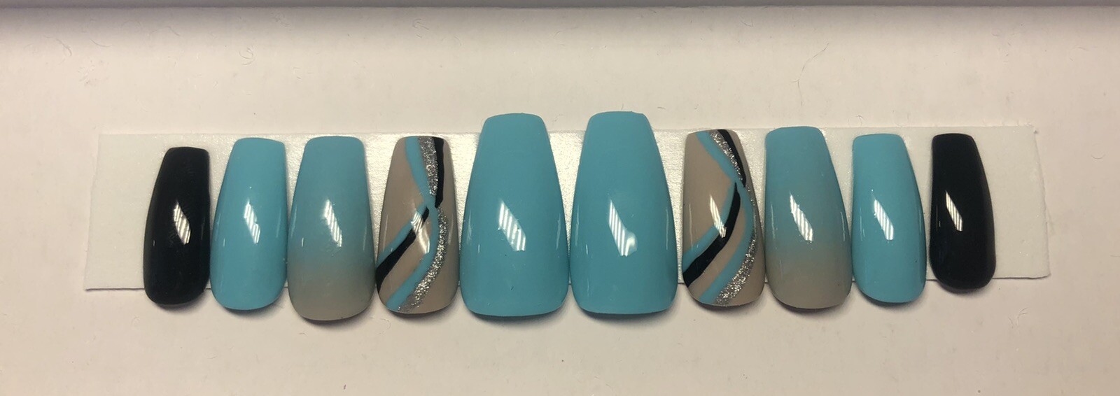 Green, black, and silver press on nails