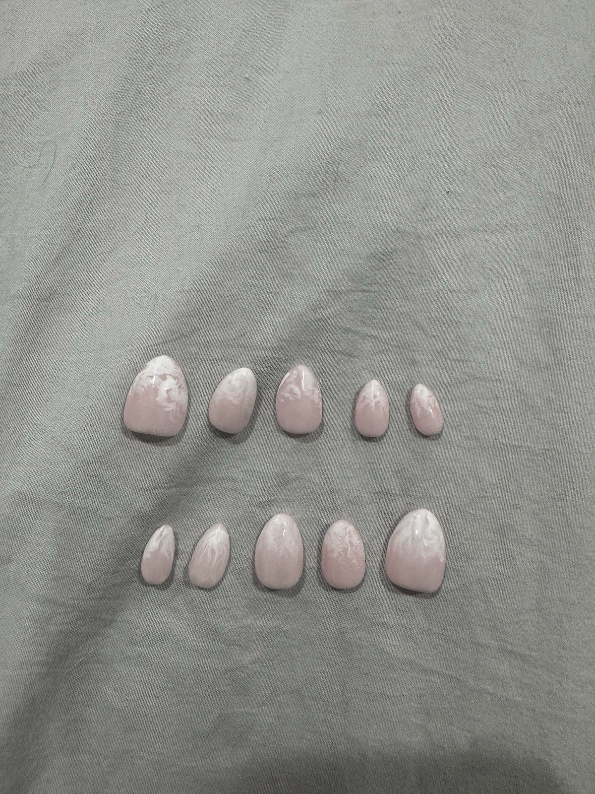 Light Pink And White Marble Short Almond Nails