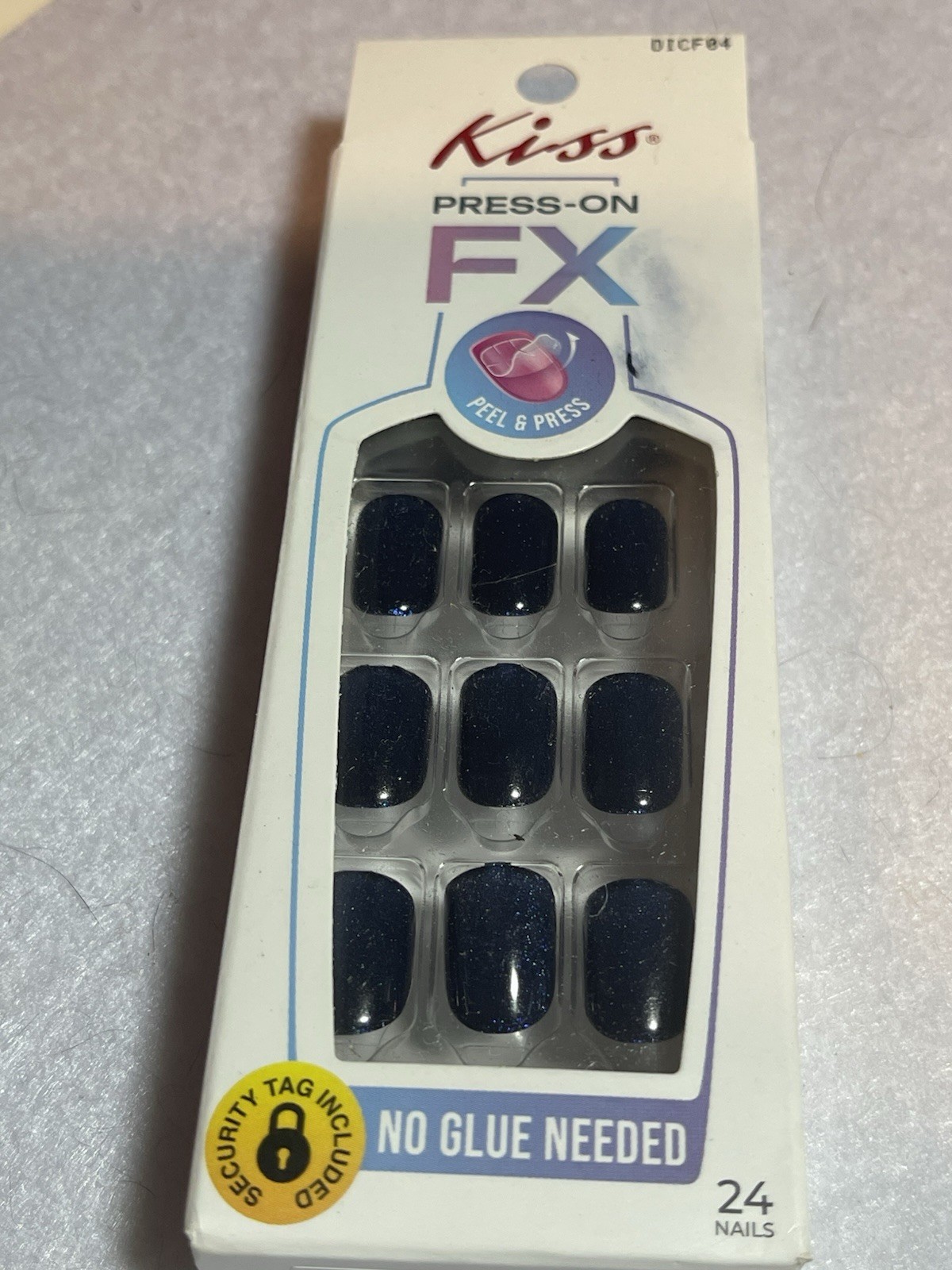 Kiss Press-On FX fake nails short squoval navy blue.