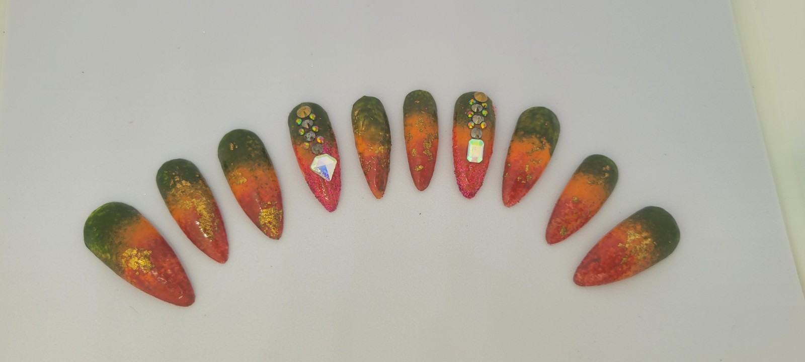 KFN ​Press On Nails| Rasta Ombre Almond Gel Glass Finish Gold Swarovski Design