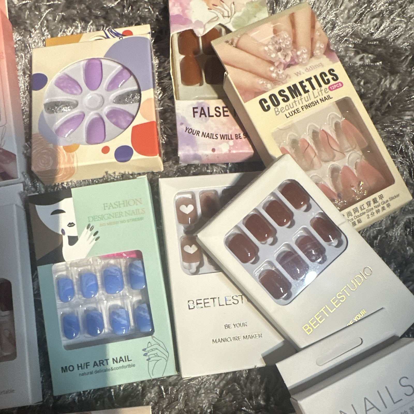 1 15 brand new nail sets * Assorted colors, designs, lengths, and styles *