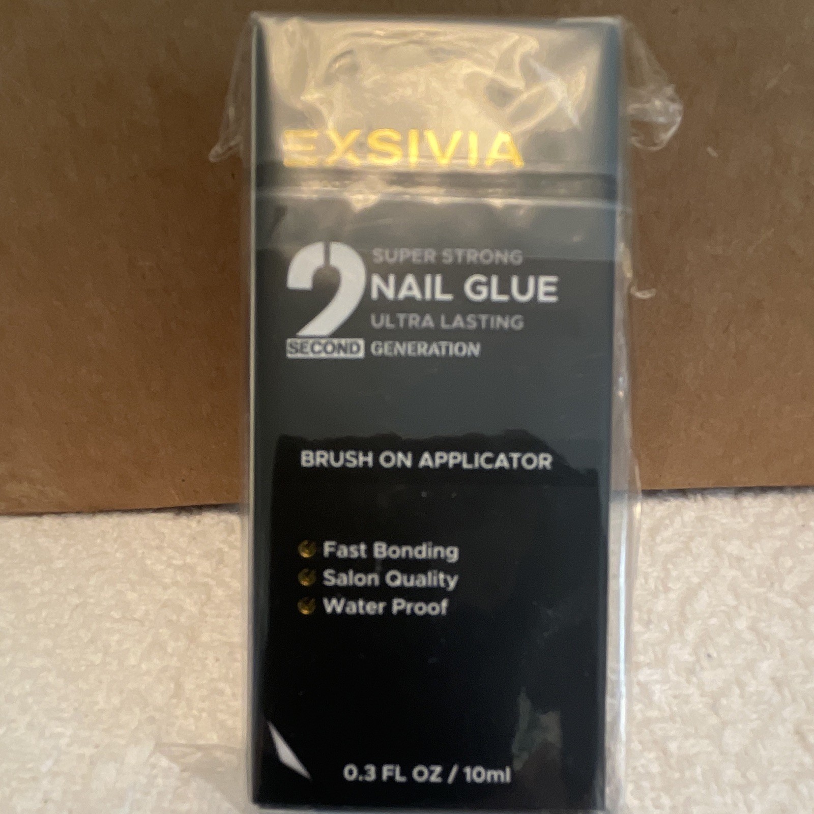 EXSIVIA Ultra Lasting Nail Glue 10ml Brush On Fast Bonding Waterproof Black