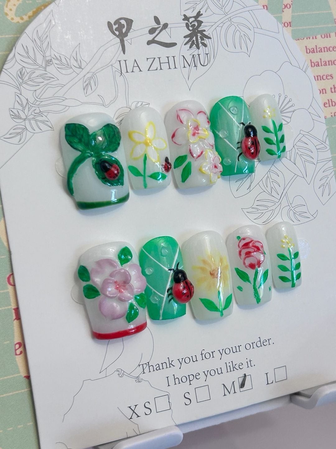 Jia Zhi Mu Handmade Floral and Ladybug Theme Press-On Nails