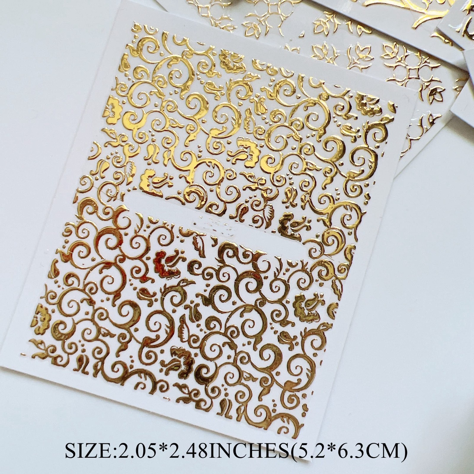 Luxury Gold Nail Art Stickers – 26 Sheets, Unique Shapes, Adhesive Decals for DI