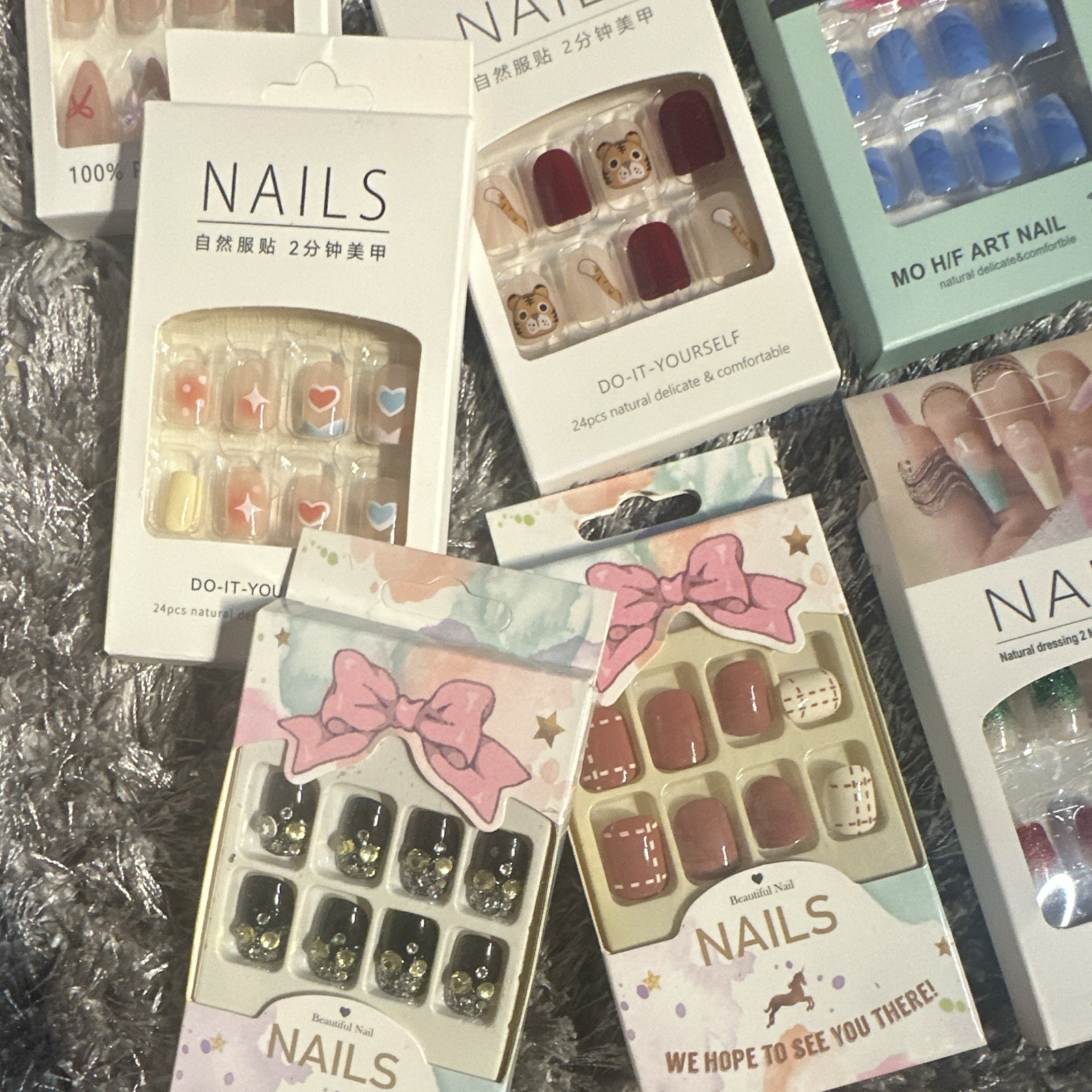 1 15 brand new nail sets * Assorted colors, designs, lengths, and styles *