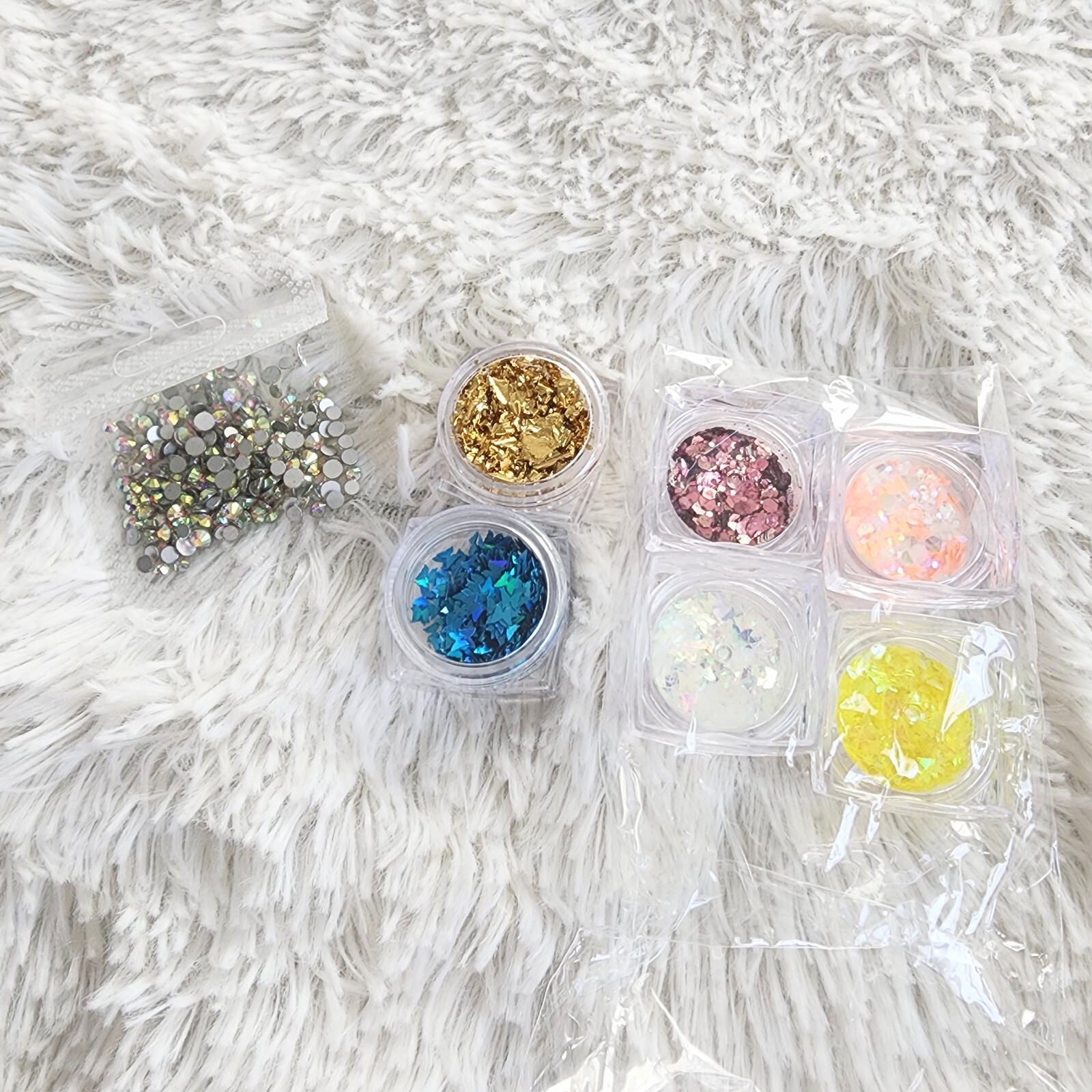 Nail glitter and stickable rhinestones butterfly glitters new and sealed