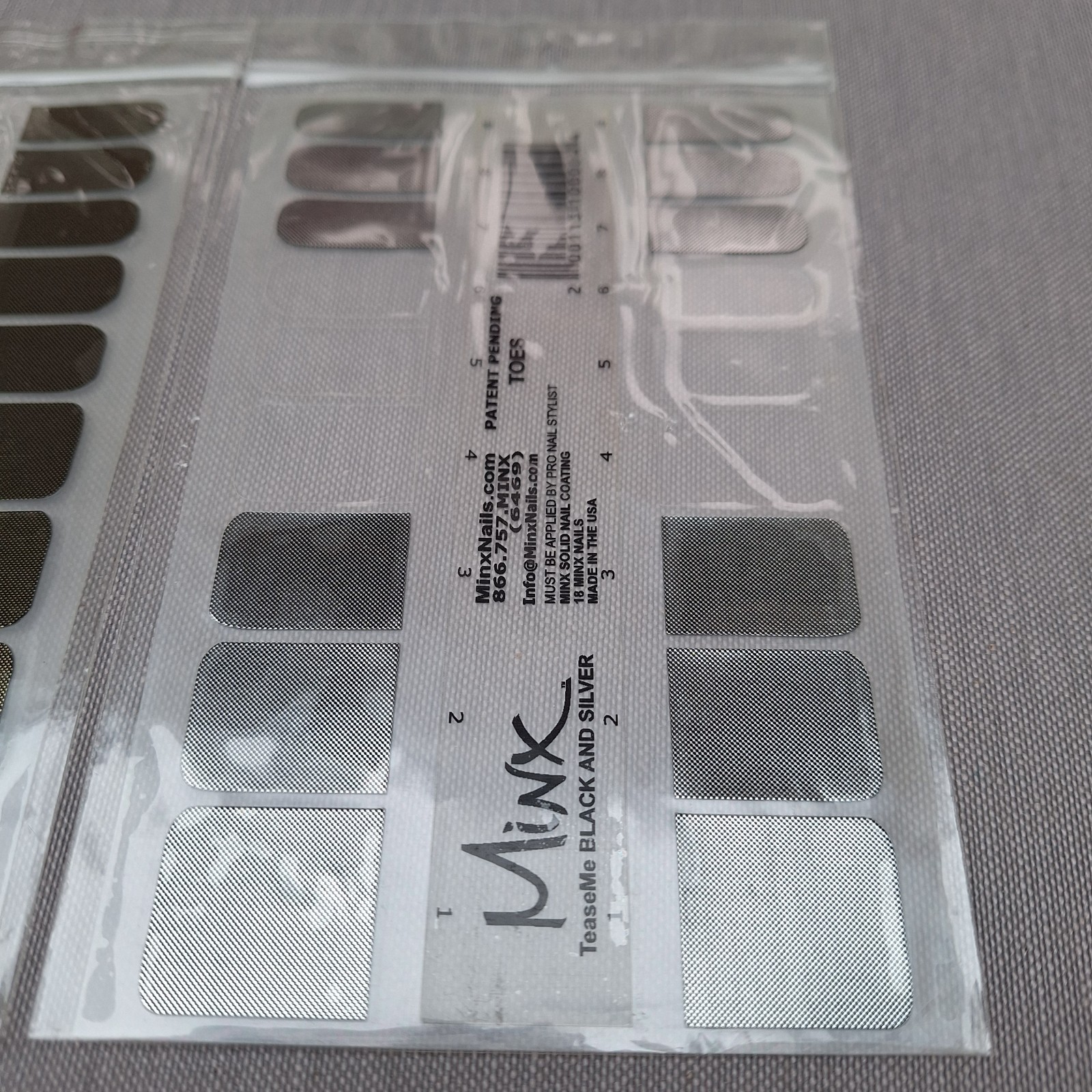 Gold and Silver on Black base. Minx Professional Finger/Toe Nail Wraps/Foils.
