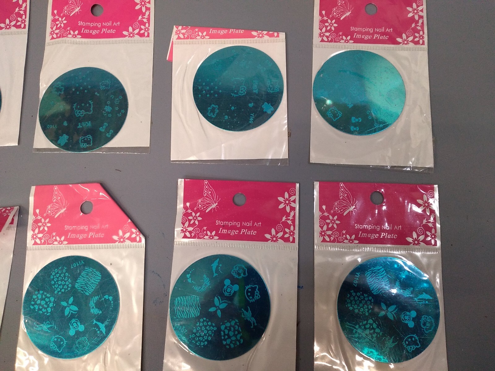 Lot of 10 Stamping Nail Art Image Plates Hello Kitty Mickey Mouse Etc Designs