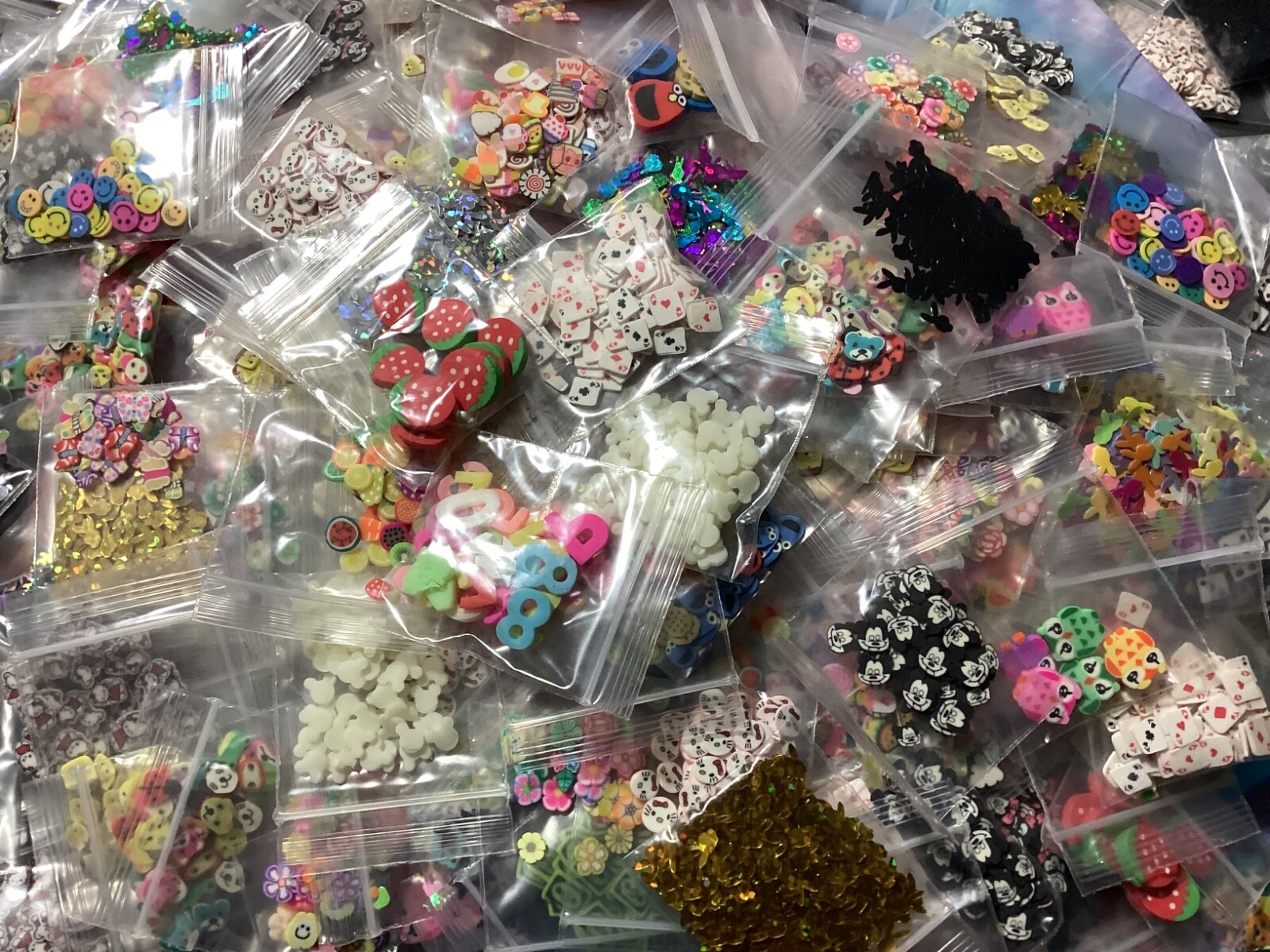 10 poly clay plastic just a pinch bags of glitter.