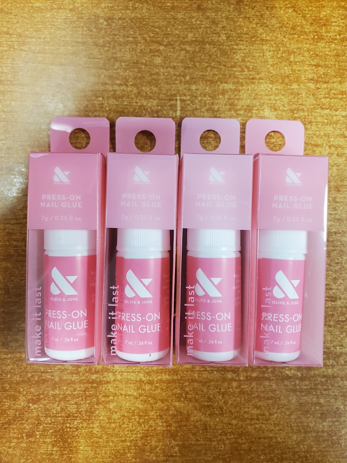 4 Pack: Olive & June Brush on Nail Glue 0.24oz. Non-Toxic/Damaging (9483-R7P6a)