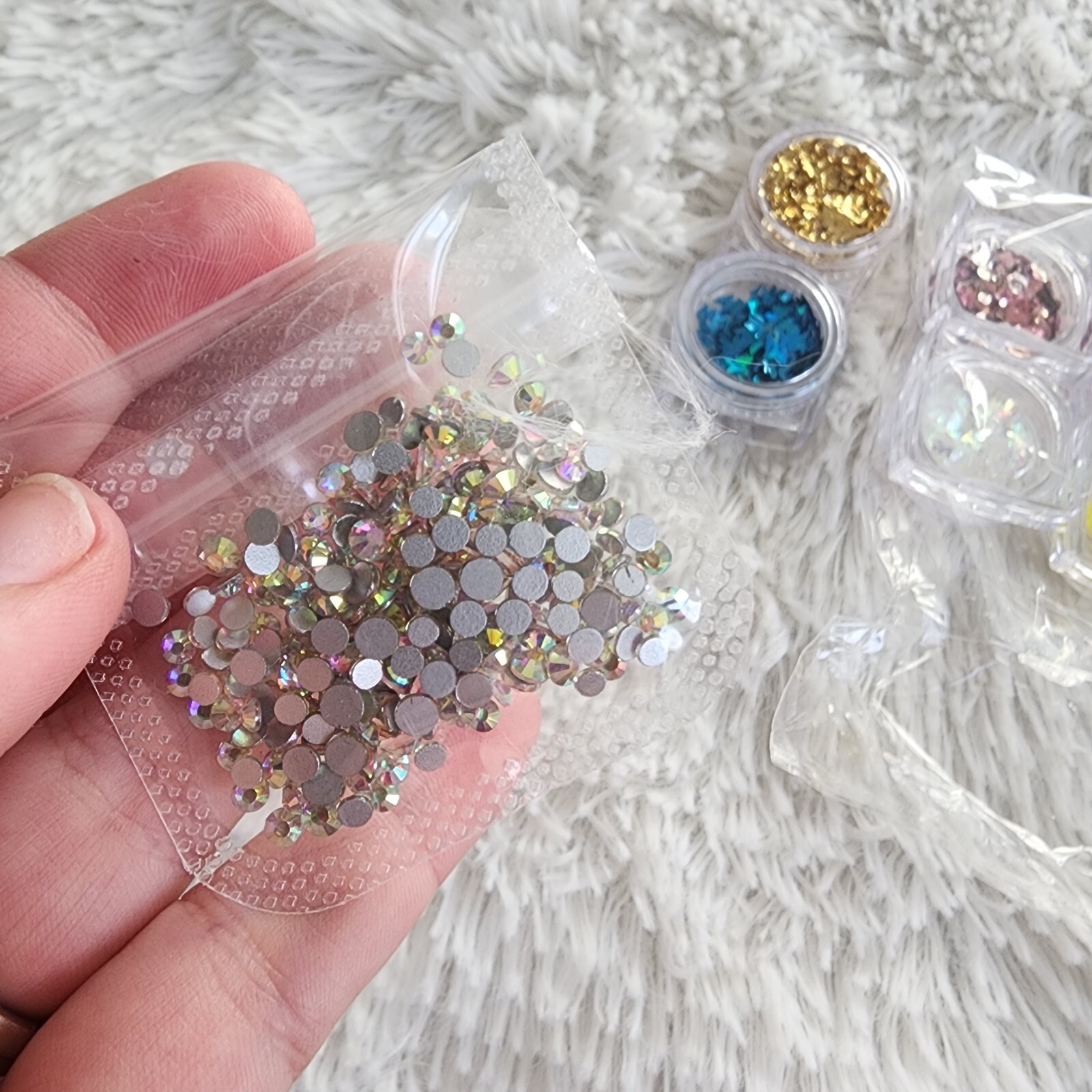 Nail glitter and stickable rhinestones butterfly glitters new and sealed