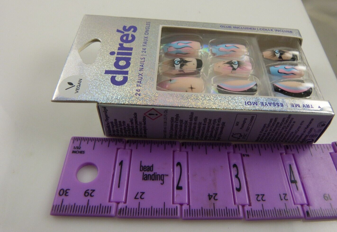 Claire’s faux false nails halloween goth evil eye flames pink blue black