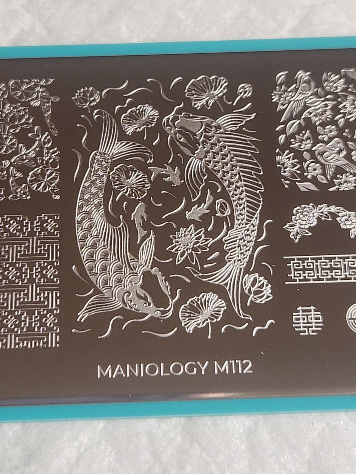 Maniology Nail Stamping Plate – M112 – Koi Pond