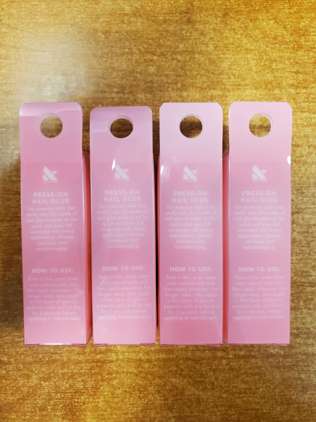 4 Pack: Olive & June Brush on Nail Glue 0.24oz. Non-Toxic/Damaging (9483-R7P6a)