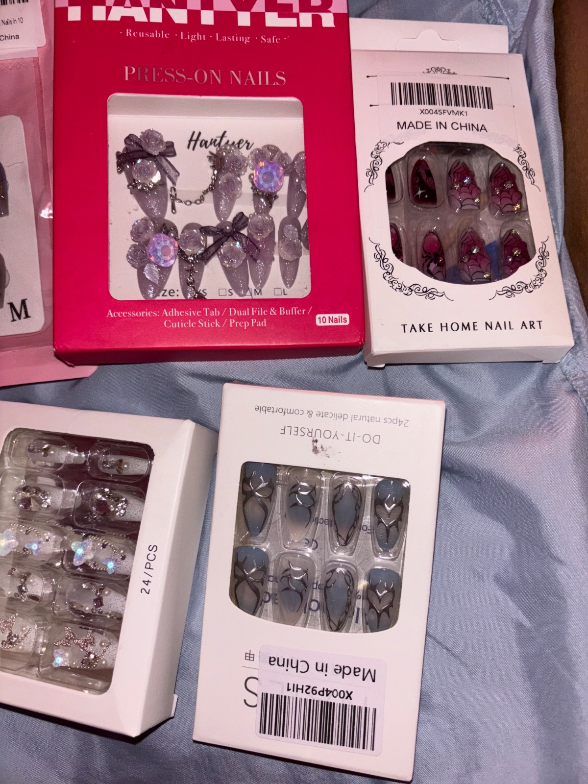 Multiple boxes jeweled nails
