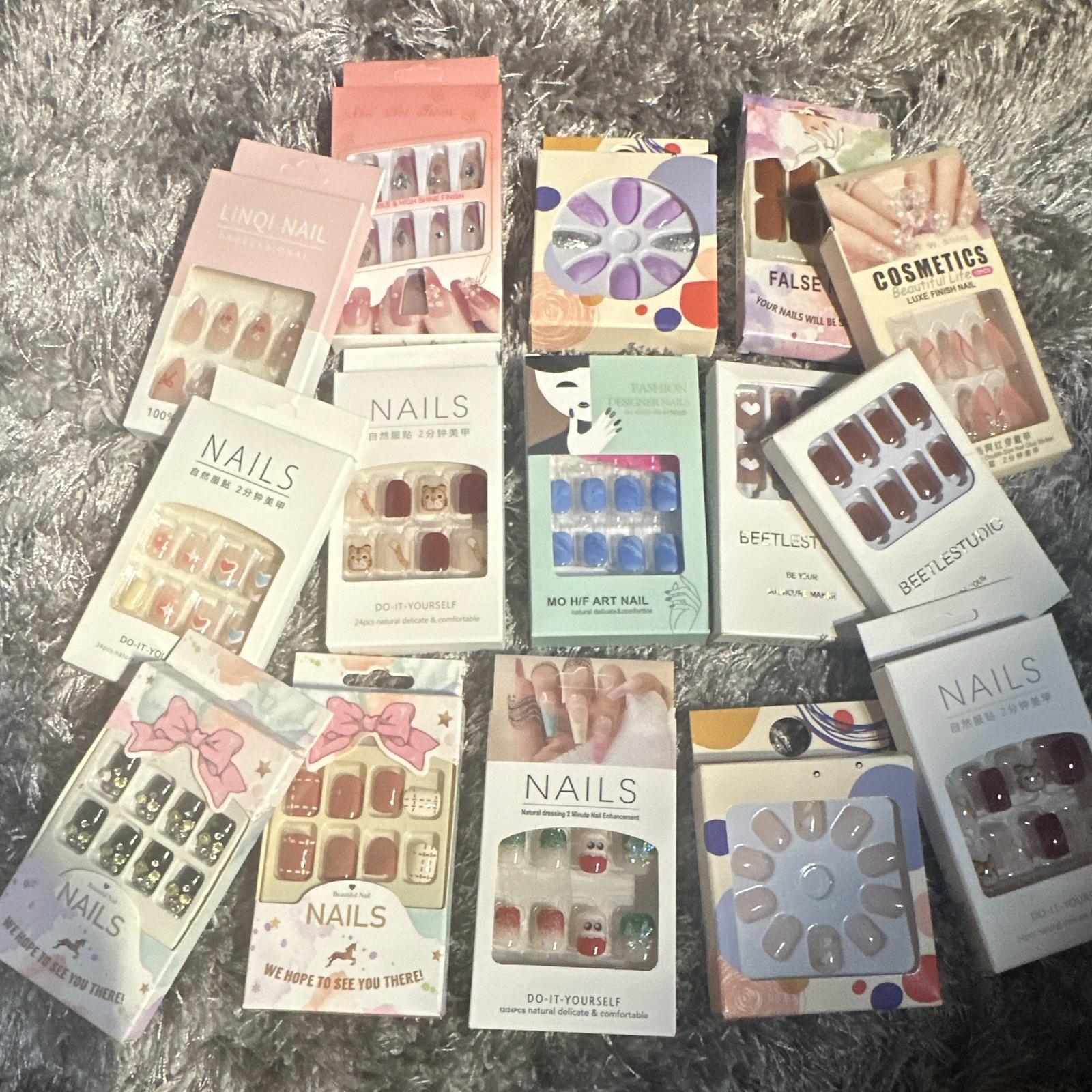 1 15 brand new nail sets * Assorted colors, designs, lengths, and styles *